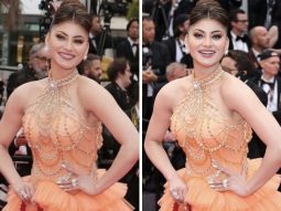 Urvashi Rautela steals the spotlight at Cannes 2023, adorned in an orange frill gown that exudes ethereal beauty and unmatched glamour