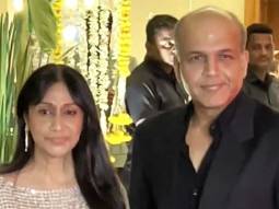 Ashutosh Gowariker poses with wife Sunita at Madhu Mantena & Ira Trivedi’s reception