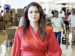 Kajol looks mesmerizing in a red wrap dress