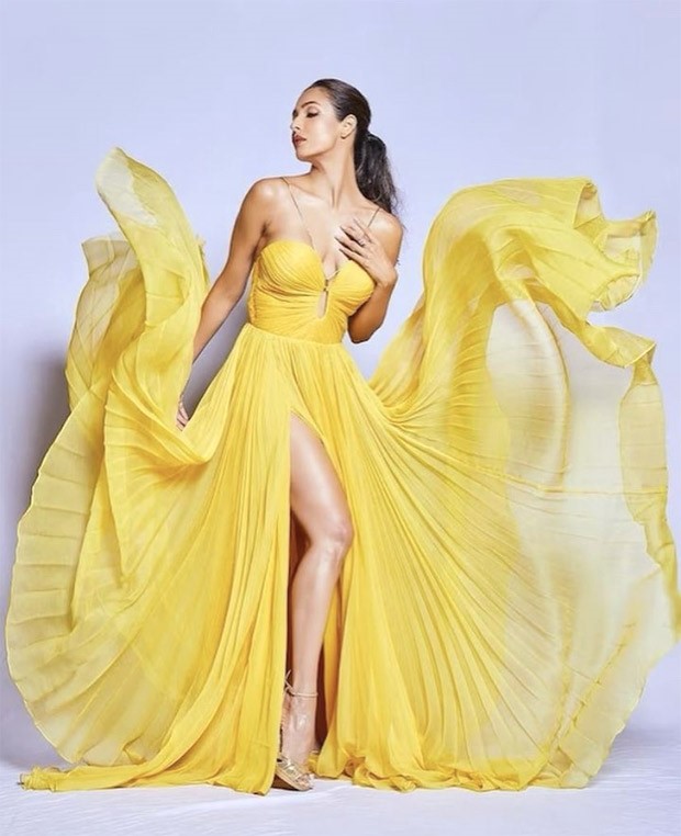 Malaika Arora is sunshine personified in yellow pleated gown worth Rs.87,518