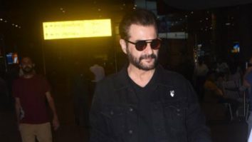 Sanjay Kapoor poses for a selfie with fans at the airport