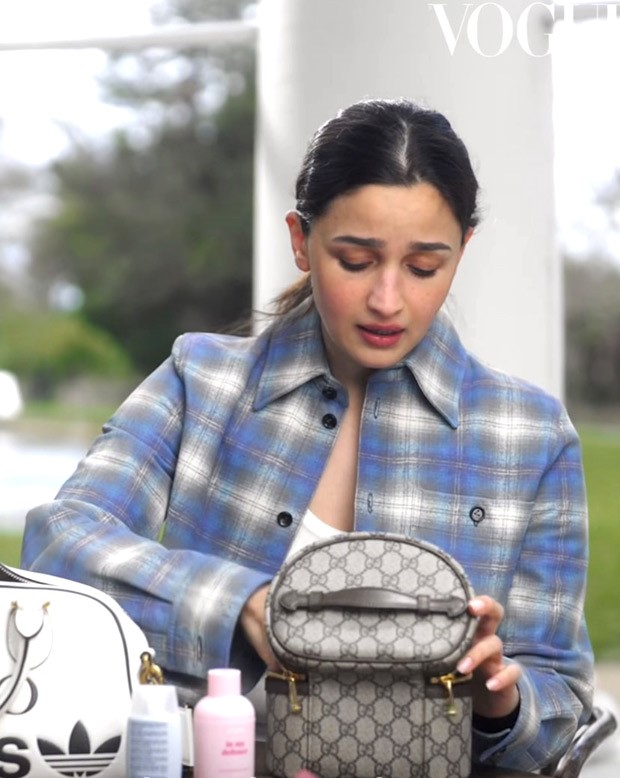 Alia Bhatt unpacks the items that make up her life and fit into a Gucci X Adidas bag in an exclusive interview with Vogue