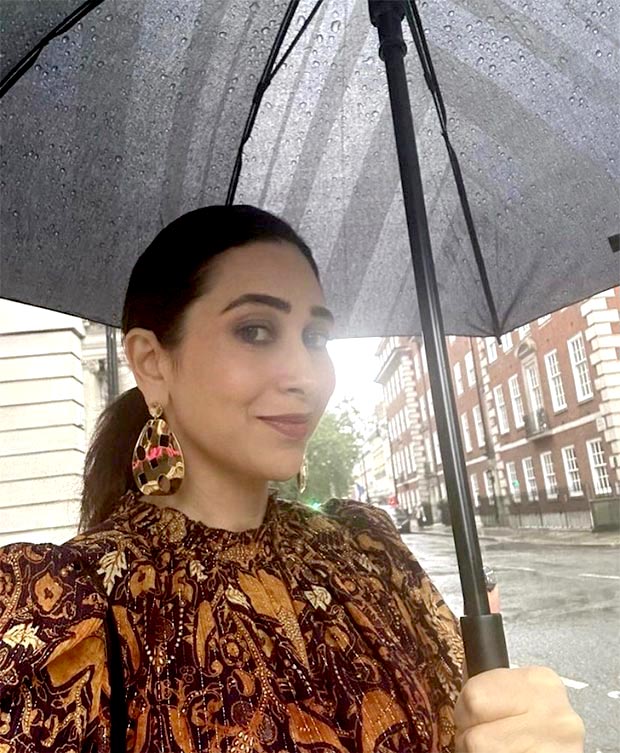 Karisma Kapoor shares pictures from her lovely rainy-day adventure in London dressed in brown printed mini dress