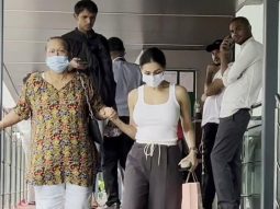 Malaika Arora walks hand in hand with her mom as they get clicked