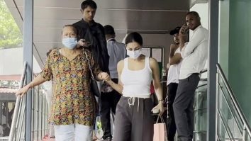 Malaika Arora walks hand in hand with her mom as they get clicked