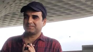 Pankaj Tripathi smiles as he poses for paps at the airport