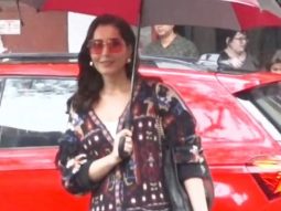 Raashii Khanna poses with an umbrella as she gets clicked in the city