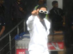Ranveer Singh poses for paps in rain wearing an all white outfit
