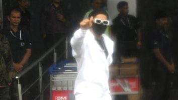 Ranveer Singh poses for paps in rain wearing an all white outfit