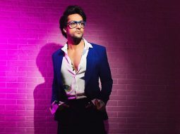 Shalin Bhanot distributes umbrellas and raincoats to needy children