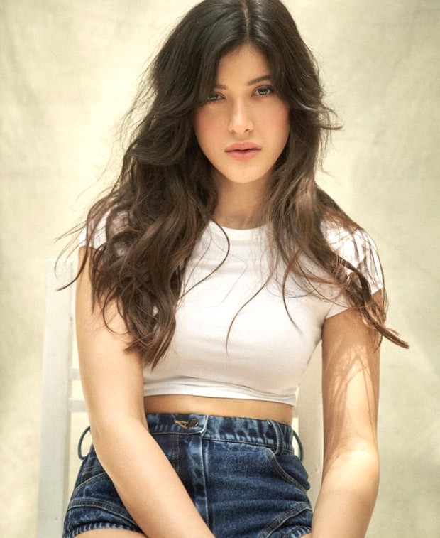 Shanaya Kapoor is adding to the heat in a white crop top and denim shorts