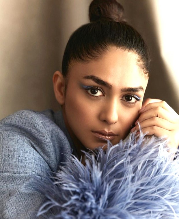 Mrunal Thakur suits up in a blue pantsuit by Falguni & Shane Peacock that is loaded with drama and glitz