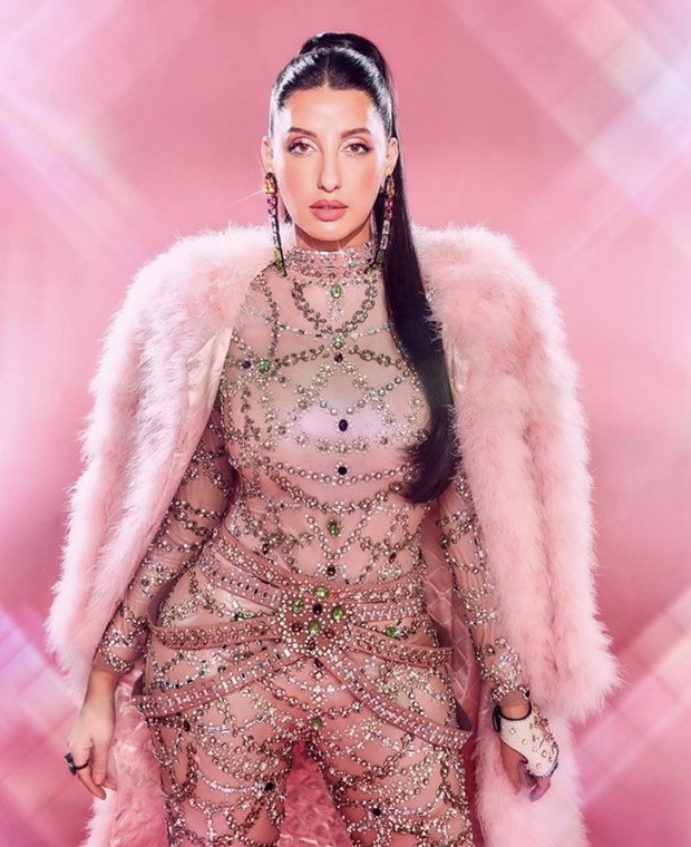 Nora Fatehi’s studded catsuit and pink fur jacket looks high on drama and higher on glam