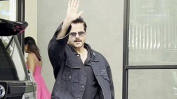 The ever handsome Anil Kapoor waves at paps
