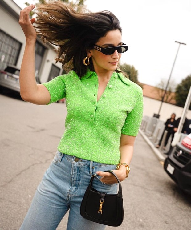 Alia Bhatt's choice of a neon green top at Gucci's SS24 show effortlessly embodies the essence of casual chic