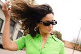 Alia Bhatt rocks the green tshirt with bellbottoms at the Gucci Spring Summer show