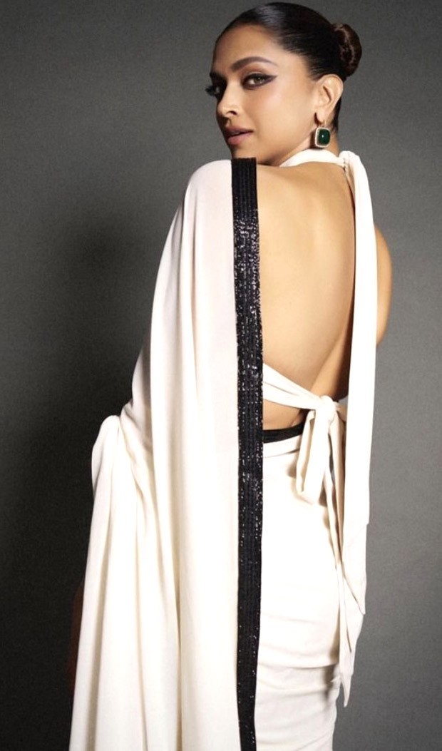 Deepika Padukone’s white encrusted saree fused with a halter neck blouse looks chic in a whole new way