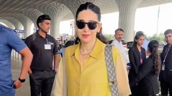 Karisma Kapoor poses for paps as she gets clicked at the airport