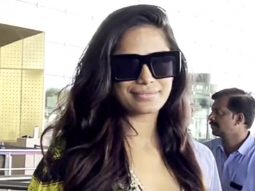 Poonam Panday greets paps at the airport as she gets clicked in a maxi dress