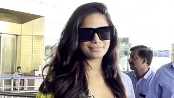 Poonam Panday greets paps at the airport as she gets clicked in a maxi dress