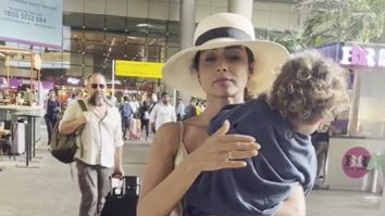 Shriya Saran gets clicked at the airport with her little munchkin!