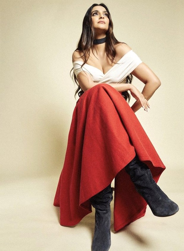 Sonam Kapoor turns up the heat with a dash of glamour in a red skirt, white bodysuit, and fierce black boots