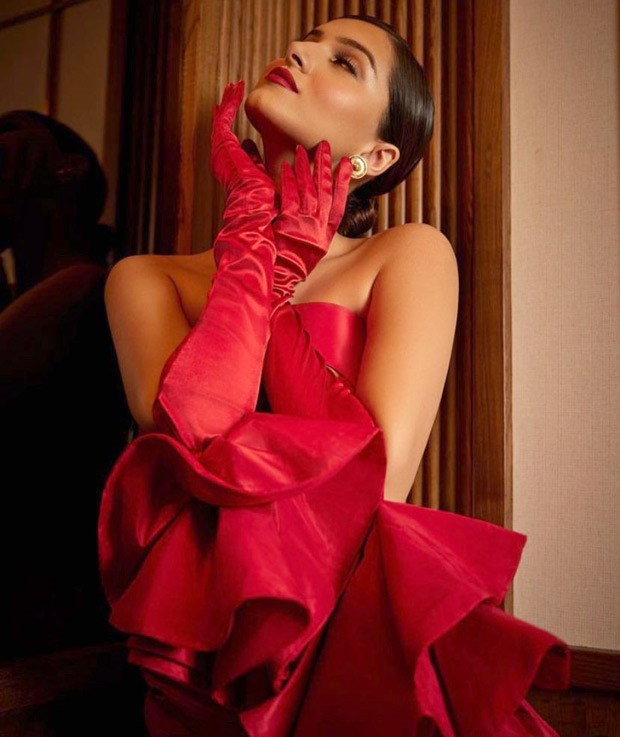 Tara Sutaria is serving up vintage vibes with her stylish red cut-out dress and dramatic gloves