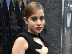 Uorfi Javed poses for paps in a black cut out dress