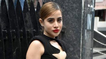 Uorfi Javed poses for paps in a black cut out dress
