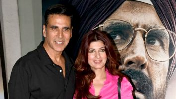Akshay Kumar poses with wife Twinkle Khanna in front of Mission Raniganj poster
