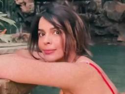 Birthday girl Mallika Sherawat cools off the heat by the waterfall