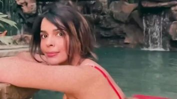Birthday girl Mallika Sherawat cools off the heat by the waterfall