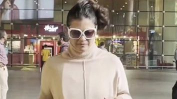 Kajol gets clicked at the ain a Manish Malhotra saree
