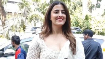 Nupur Sanon opts for a red lip in a gorgeous white salwar