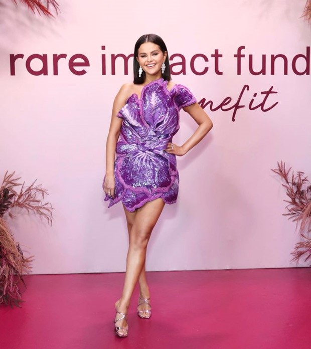 Selena Gomez shines at the Rare Impact Fund Gala in a custom purple dress by Rahul Mishra, a stunning creation inspired by the elegance of iris flowers