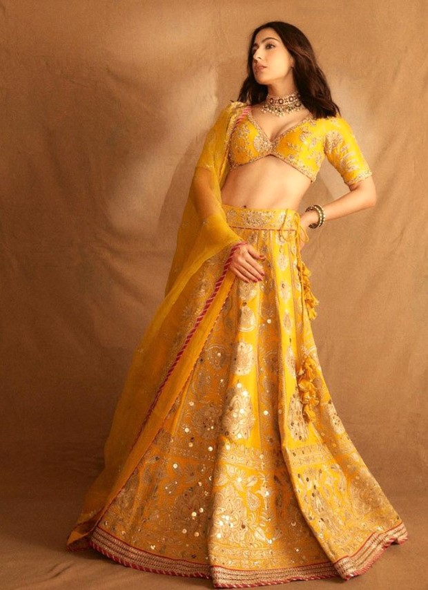Sara Ali Khan spreads her warm festive cheer in her Rs 1.55 Lakh yellow embroidered Gopi Vaid Lehenga