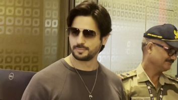 Sidharth Malhotra smiles as he gets clicked by paps at the airport