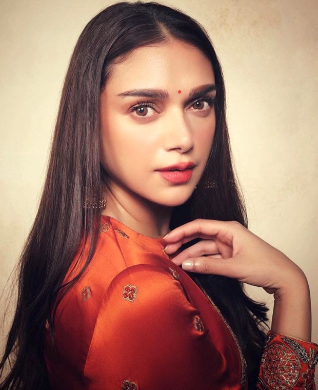Aditi Rao Hydari sets hearts ablaze in the ethereal burnt orange Raw Mango saree