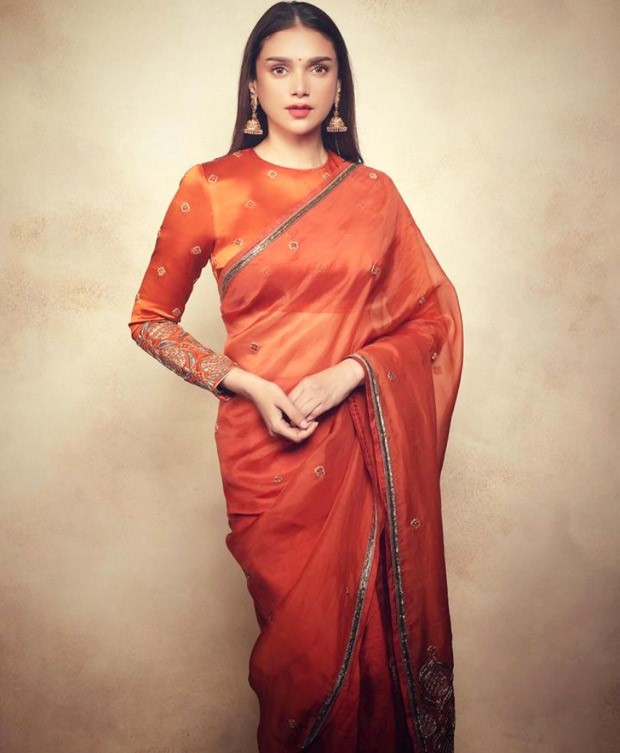 Aditi Rao Hydari sets hearts ablaze in the ethereal burnt orange Raw Mango saree