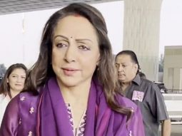 Hema Malini strikes a pose for paps in her pretty salwar at the airport