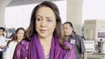 Hema Malini strikes a pose for paps in her pretty salwar at the airport