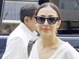 Malaika Arora waves at paps as she gets clicked in an all white outfit