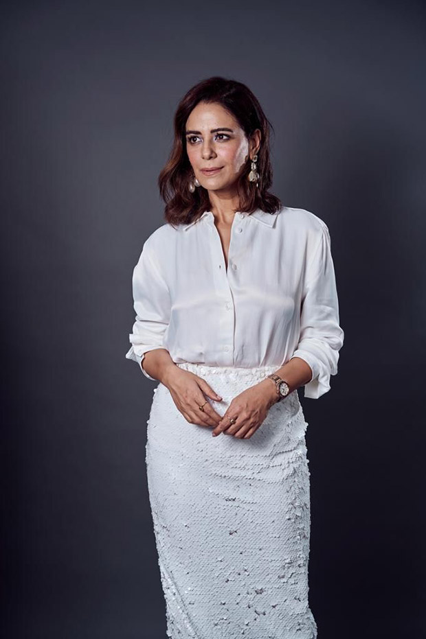 Mona Singh is looking like a vision in white shirt styled with white sequin skirt