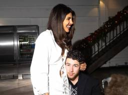 Priyanka Chopra Jonas gives a glimpse of her Christmas holiday season celebrations, as she sits on Nick Jonas’ lap