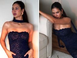 Sonam Bajwa stuns in a mesmerizing blue floral gown, complemented by a sleek scarf adorning her neck