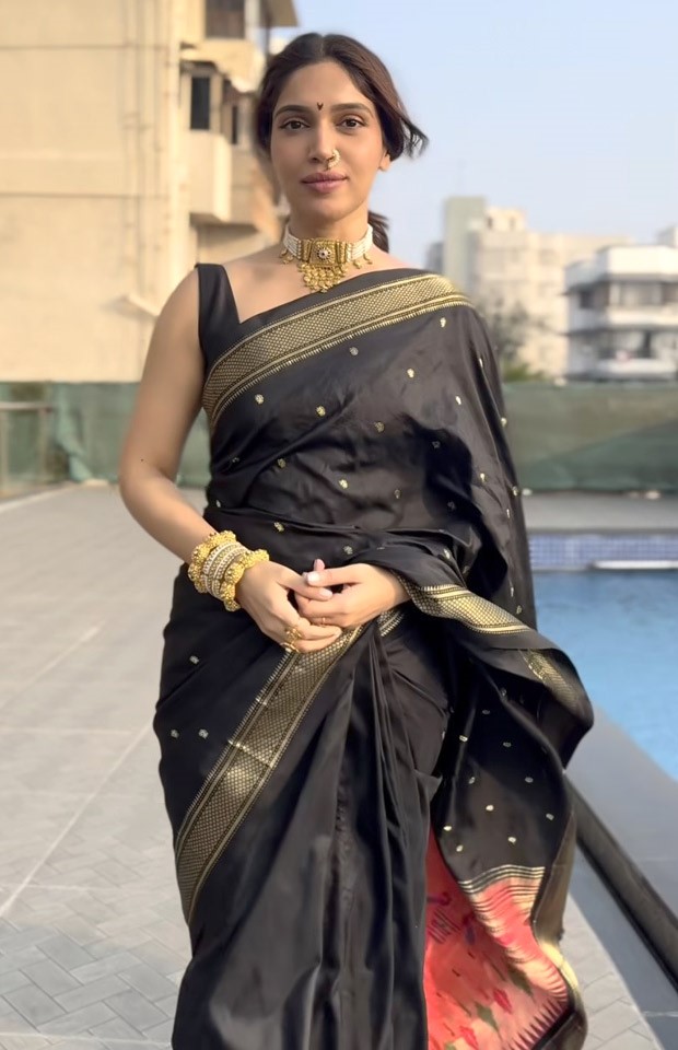 Bhumi Pednekar exudes traditional Maharashtrian charm as she gracefully adorns a black and gold silk saree, complemented by an elegant nath
