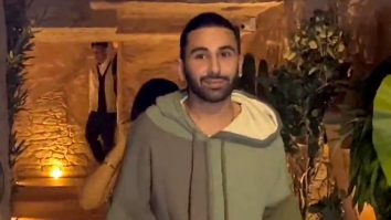 Orry flaunts his pink phonecase on popular demand by paps at Bastian