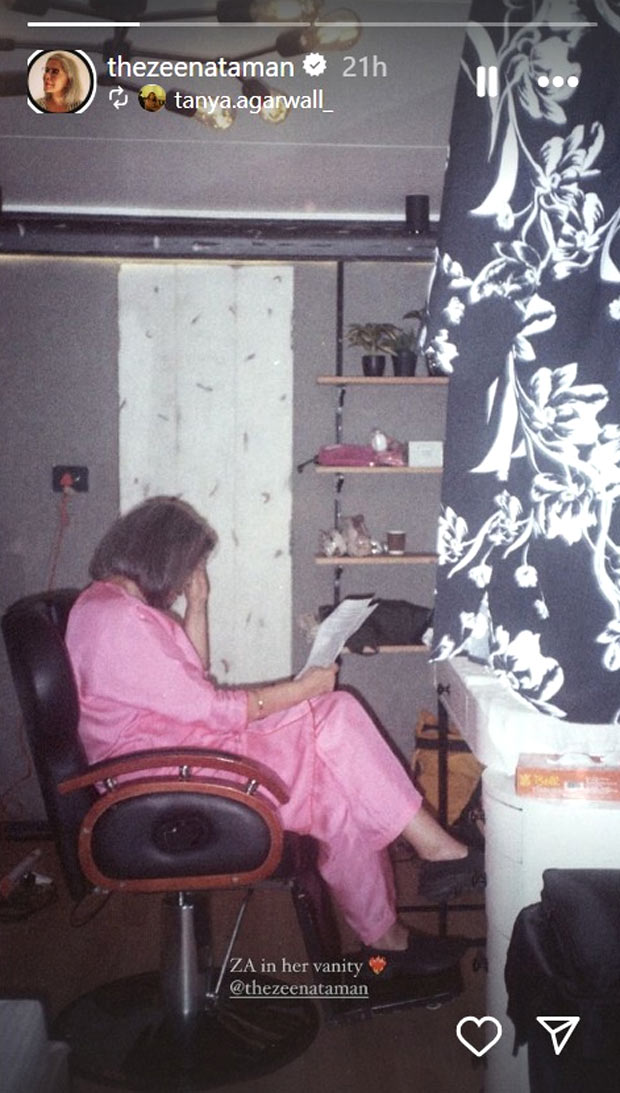 Zeenat Aman snapped during vanity van reading session; see pic