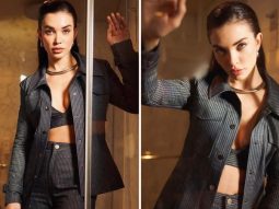 Amy Jackson takes on the role of Boss Lady in a pinstriped pantsuit for the promotion of Crakk