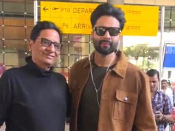 Jackky Bhagnani poses with dad Vashu Bhagnani at the airport